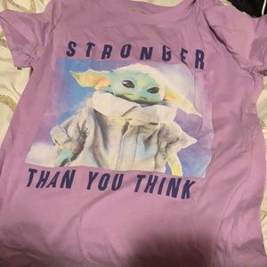 I am selling a purple baby Yoda shirt.